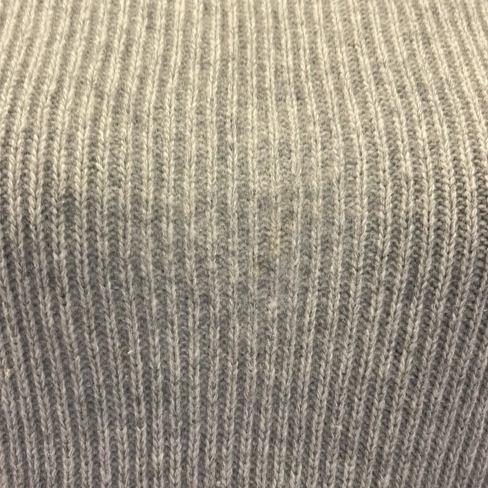 Gray crewneck sweater with lace up detail